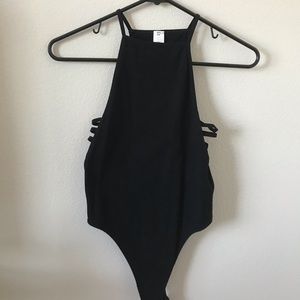 A Black bodysuit with open sides